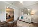 Home office with built-in shelving and a view of the dining area at 4803 Cabreo Ct, Bradenton, FL 34211