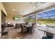 Spacious patio with seating area and views of the pool and golf course at 4803 Cabreo Ct, Bradenton, FL 34211