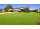 One-story home with gray garage door and manicured lawn at 4803 Cabreo Ct, Bradenton, FL 34211