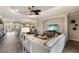 Bright and airy living room with hardwood floors, a comfortable seating area, and an open floor plan at 4803 Cabreo Ct, Bradenton, FL 34211
