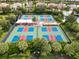 Well-maintained pickleball courts with covered seating area at 4803 Cabreo Ct, Bradenton, FL 34211
