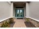 Inviting entryway with double doors and a light-colored floor at 4803 Cabreo Ct, Bradenton, FL 34211
