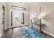 Home features an inviting entryway with hardwood floors and a large art piece at 4803 Cabreo Ct, Bradenton, FL 34211