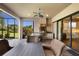 Outdoor kitchen with stainless steel appliances and granite countertops at 4803 Cabreo Ct, Bradenton, FL 34211