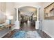 Bright and spacious entryway, featuring hardwood floors and a view to the living area at 4803 Cabreo Ct, Bradenton, FL 34211