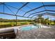 Inviting pool area with patio furniture and screened enclosure at 4803 Cabreo Ct, Bradenton, FL 34211
