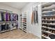 Organized walk-in closet with shelving, drawers, and hanging space at 4803 Cabreo Ct, Bradenton, FL 34211