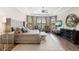 Bright main bedroom featuring a king-size bed and ample natural light at 4803 Cabreo Ct, Bradenton, FL 34211