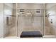Large walk-in shower with built-in seat and glass enclosure at 4803 Cabreo Ct, Bradenton, FL 34211
