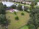 Aerial view of a community park with playground, dog park, and picnic area at 4803 Cabreo Ct, Bradenton, FL 34211