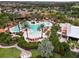 Expansive pool area with lounge chairs and landscaping at 4803 Cabreo Ct, Bradenton, FL 34211