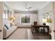 Bright home office with built-in shelving and window seat at 4803 Cabreo Ct, Bradenton, FL 34211