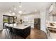 Modern kitchen features a large island, stainless steel appliances, and ample counter space at 4803 Cabreo Ct, Bradenton, FL 34211