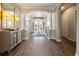 Spacious foyer with hardwood floors and decorative accents at 4803 Cabreo Ct, Bradenton, FL 34211