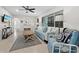 Living room with light teal couch and wooden coffee table at 2907 Marshall Dr, Sarasota, FL 34239