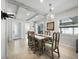Charming dining room with farmhouse table and chandelier at 2907 Marshall Dr, Sarasota, FL 34239
