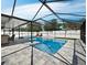 Inviting screened pool and spa with plenty of patio space at 2907 Marshall Dr, Sarasota, FL 34239