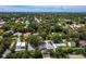 Aerial perspective of a neighborhood, highlighting homes nestled among green trees at 2907 Marshall Dr, Sarasota, FL 34239
