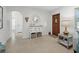 Home entry with white console table and wood floors at 2907 Marshall Dr, Sarasota, FL 34239