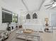 Guest bedroom with daybed and exposed ceiling beams at 2907 Marshall Dr, Sarasota, FL 34239