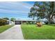 Single story home with carport and landscaped yard at 2907 Marshall Dr, Sarasota, FL 34239