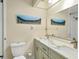 Bathroom with dual sinks and updated vanity at 3541 Wilkinson Woods Dr # 40, Sarasota, FL 34231