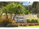 Community entrance sign for Wilkinson Woods at 3541 Wilkinson Woods Dr # 40, Sarasota, FL 34231