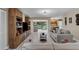 Living room with view of backyard and skylight at 3541 Wilkinson Woods Dr # 40, Sarasota, FL 34231