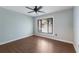Bedroom with wood-look floors and natural light at 3601 Quail Hollow Ln, Bradenton, FL 34210