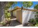 Charming exterior showcasing a walkway leading to the entrance, surrounded by lush greenery and mature trees at 3601 Quail Hollow Ln, Bradenton, FL 34210