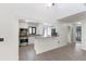 Bright and spacious kitchen featuring modern stainless steel appliances and a granite countertop at 3601 Quail Hollow Ln, Bradenton, FL 34210