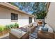 Cozy patio area with outdoor seating and a hot tub at 3601 Quail Hollow Ln, Bradenton, FL 34210