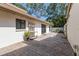 Home's patio area featuring lovely brick flooring at 3601 Quail Hollow Ln, Bradenton, FL 34210