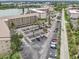 Aerial view of building and parking area at 3777 Lake Bayshore Dr # H401, Bradenton, FL 34205