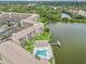 Aerial view showing condo community near lake at 3777 Lake Bayshore Dr # H401, Bradenton, FL 34205