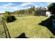 Large backyard with grassy lawn and privacy fence at 1922 6Th St E, Palmetto, FL 34221