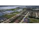 Aerial view of a home in a residential neighborhood near the water at 1922 6Th St E, Palmetto, FL 34221