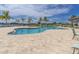 Community resort-style pool with ample lounge chairs at 1922 6Th St E, Palmetto, FL 34221