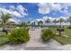 Relaxing waterfront patio area with seating, umbrellas, and grills at 1922 6Th St E, Palmetto, FL 34221