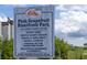 Pink Grapefruit Riverfront Park sign with amenities listed at 1922 6Th St E, Palmetto, FL 34221