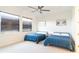 Guest bedroom with two twin beds and plenty of natural light at 1922 6Th St E, Palmetto, FL 34221