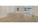 Open living room with view of the pool at 4724 Seville Dr, Sarasota, FL 34235
