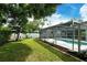 Screened-in pool and backyard area at 4724 Seville Dr, Sarasota, FL 34235