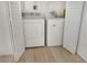 Laundry room with washer and dryer and vinyl flooring at 4724 Seville Dr, Sarasota, FL 34235