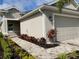 Side view of house showing garage and walkway at 4254 Golden Creek Ter, Parrish, FL 34219