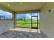 Spacious screened patio overlooking a green lawn at 4254 Golden Creek Ter, Parrish, FL 34219