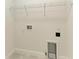 Laundry room with shelving and hookups for washer and dryer at 4254 Golden Creek Ter, Parrish, FL 34219