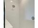 Clean shower with white tile and a rainfall shower head at 4254 Golden Creek Ter, Parrish, FL 34219