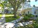 Community features lush landscaping and walking paths at 5933 17Th W St # A24, Bradenton, FL 34207