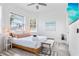 Cozy bedroom with a queen-size bed and ample natural light at 3811 Bayside Cir, Bradenton, FL 34210